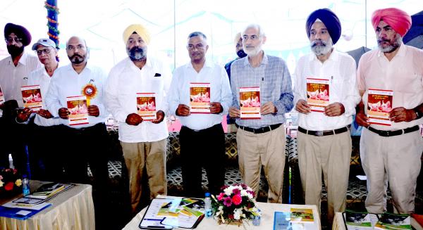 Dignitaries releasing Book in Pashu palan Mela on Dated 24-09-2022